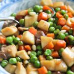 SAUTÉED CARROTS, PEAS AND TRUMPET MUSHROOMS